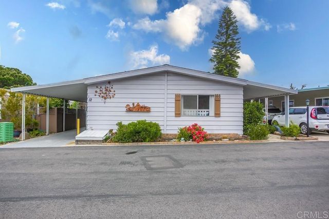 a front view of house with garage