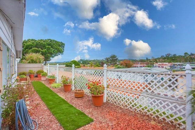 a view of a city with lots of tall trees