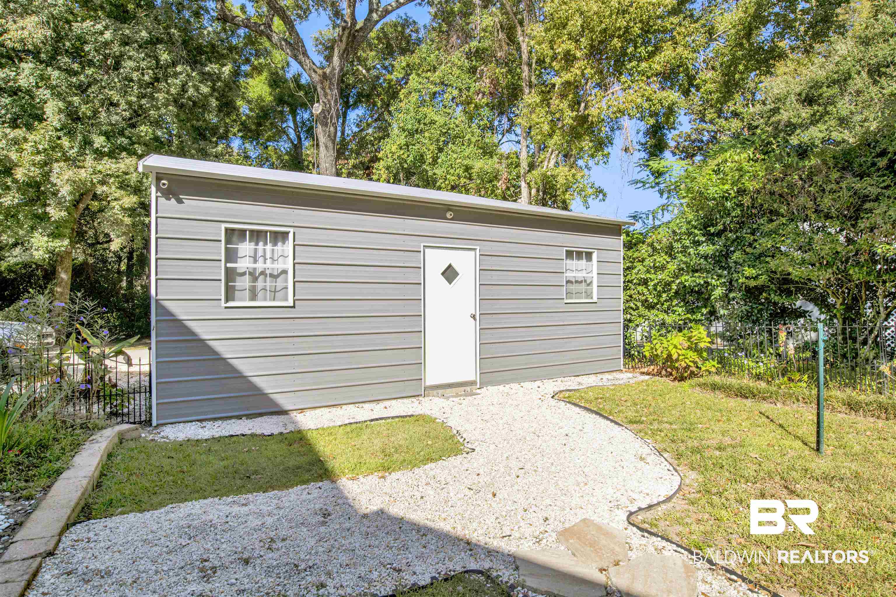 605 Van Avenue Daphne, AL 36526 - Photo 27 of 37 View of outbuilding featuring a lawn