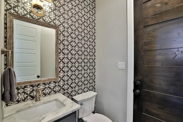a bathroom with a sink and a toilet