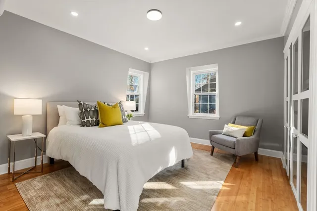 a bathroom with a sink vanity and a shower