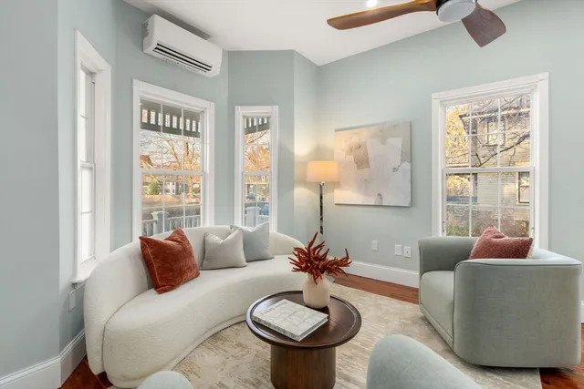 a bedroom with bed and window