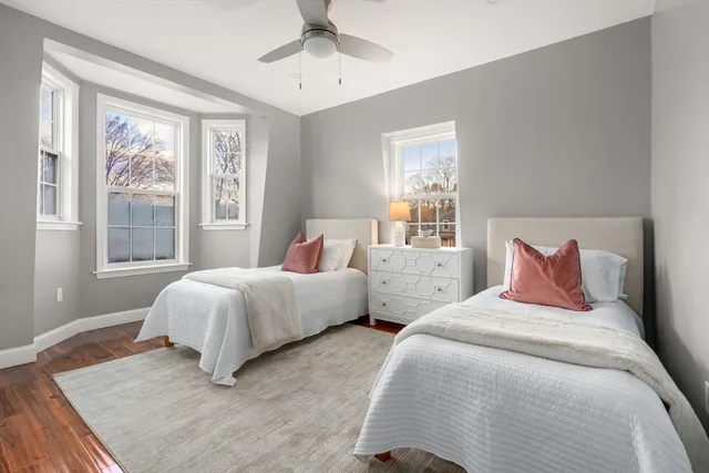 front view of residential houses with a yard