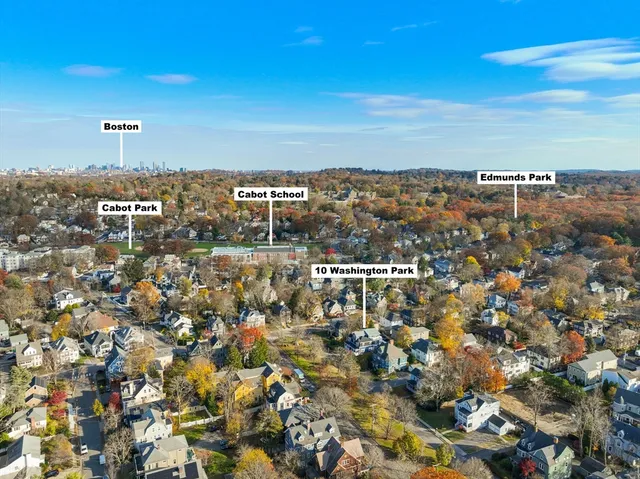 a view of a roof deck with wooden floor and fence