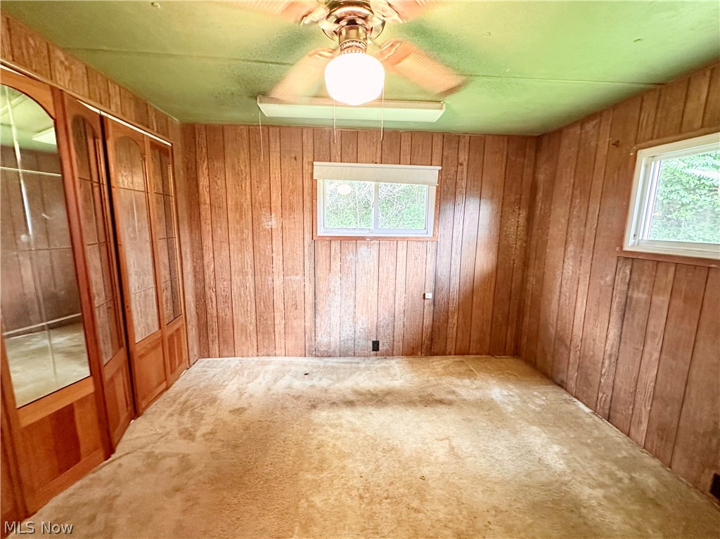 28 Richter Road Colliers, WV 26035 - Photo 11 of 38 Bedroom featuring ceiling fan and carpet flooring