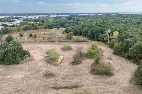 an aerial view of a houses with outdoor space