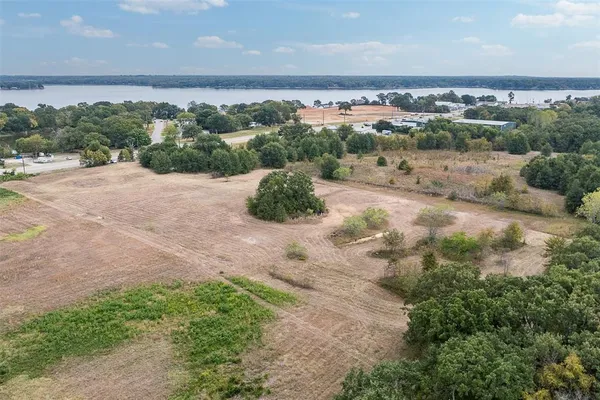 a view of a road with an ocean beach