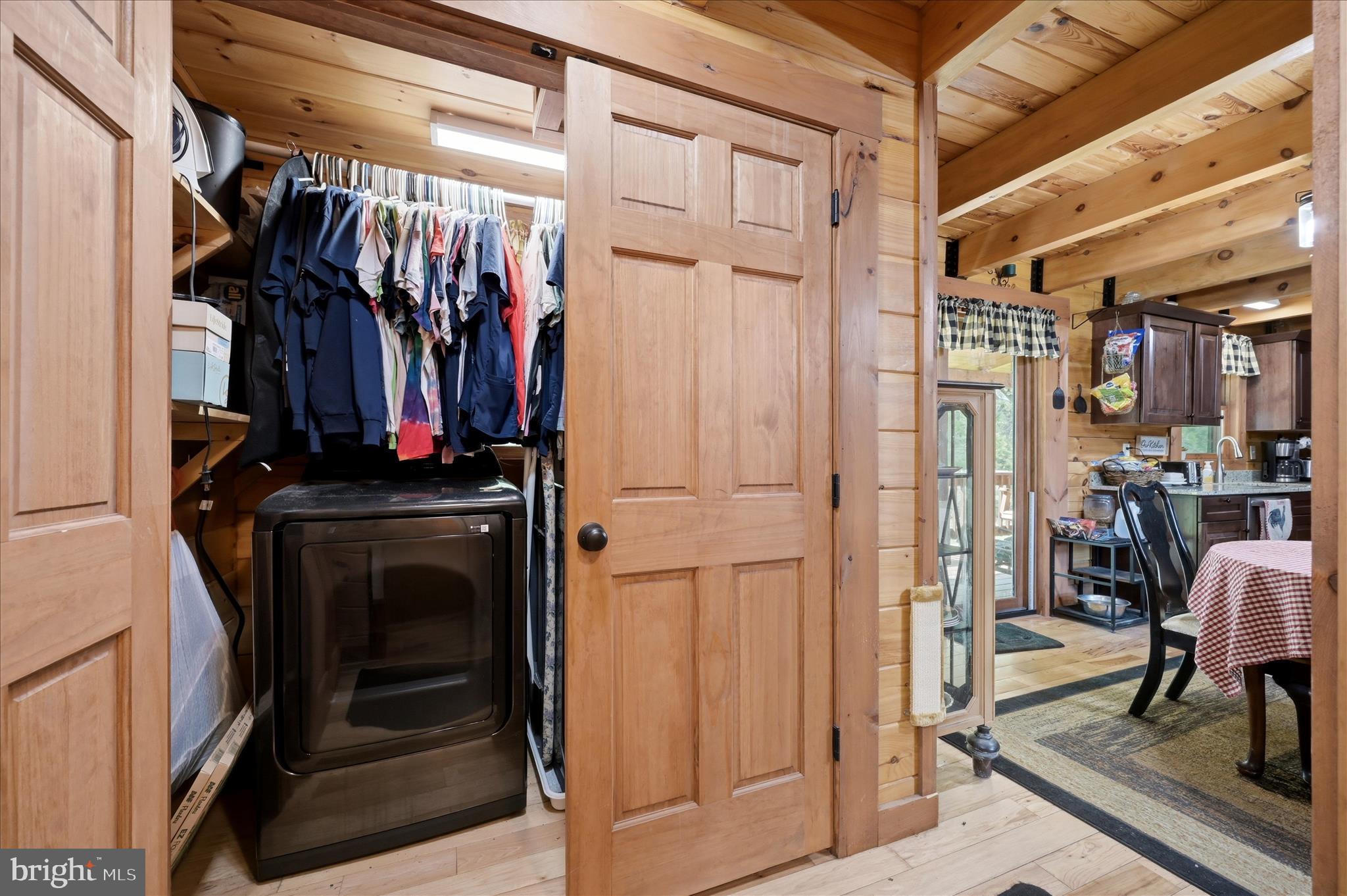 459 Springfield Estates Drive Rileyville, VA 22650 - Photo 44 of 63 a view of walk in closet with clothes and shoes