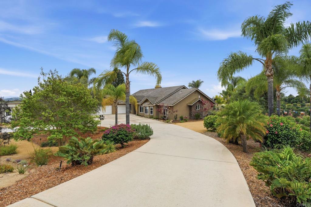 1655 Colina Vista Fallbrook, CA 92028 - Photo 2 of 63 a picture of a houses with a yard and garden