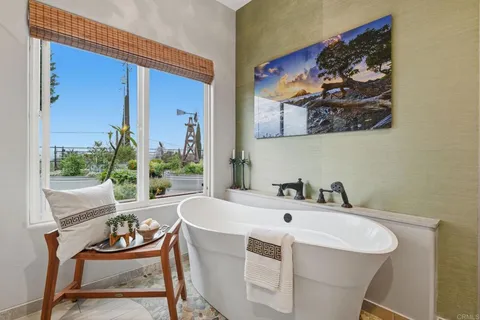 a bathroom with a double vanity sink mirror and double
