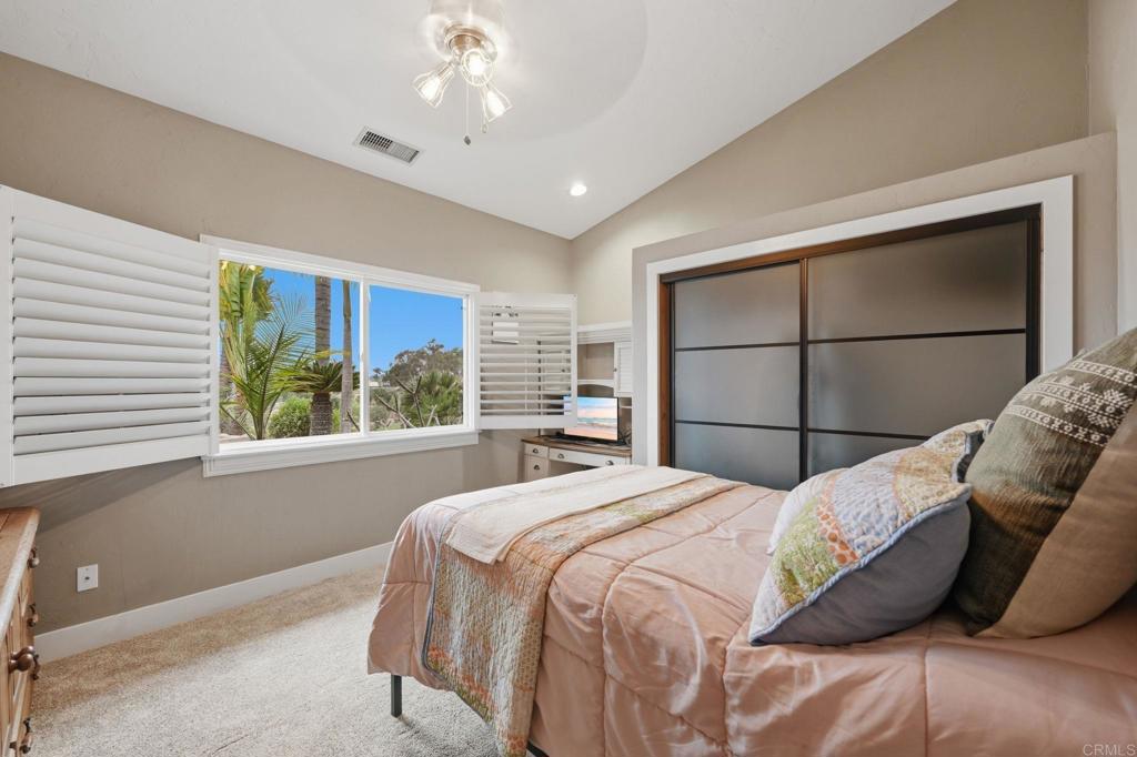 1655 Colina Vista Fallbrook, CA 92028 - Photo 29 of 63 a bedroom with a large bed and a large window