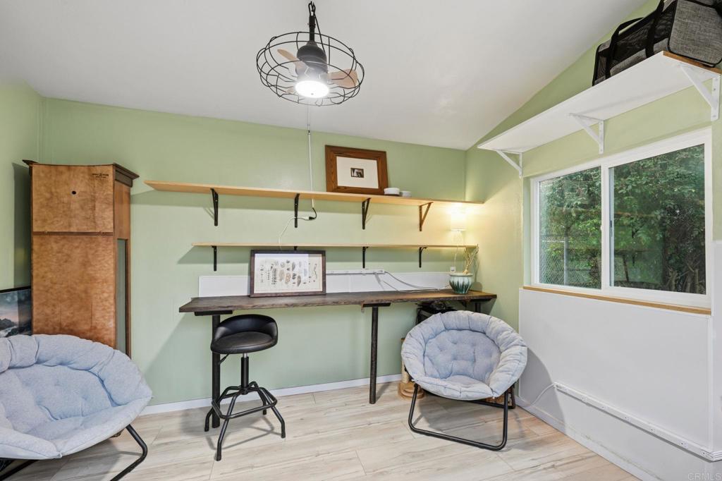 1655 Colina Vista Fallbrook, CA 92028 - Photo 35 of 63 a room with furniture and a chandelier