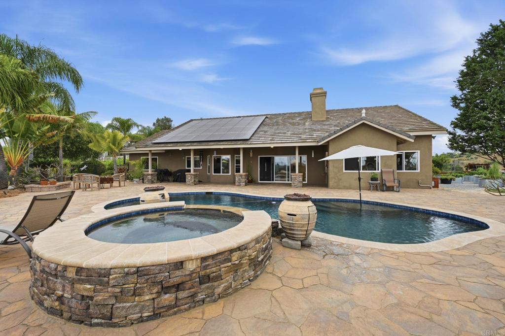 1655 Colina Vista Fallbrook, CA 92028 - Photo 40 of 63 a front view of house with swimming pool and yard