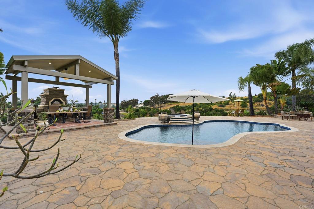 1655 Colina Vista Fallbrook, CA 92028 - Photo 42 of 63 a view of swimming pool with outdoor seating and plants