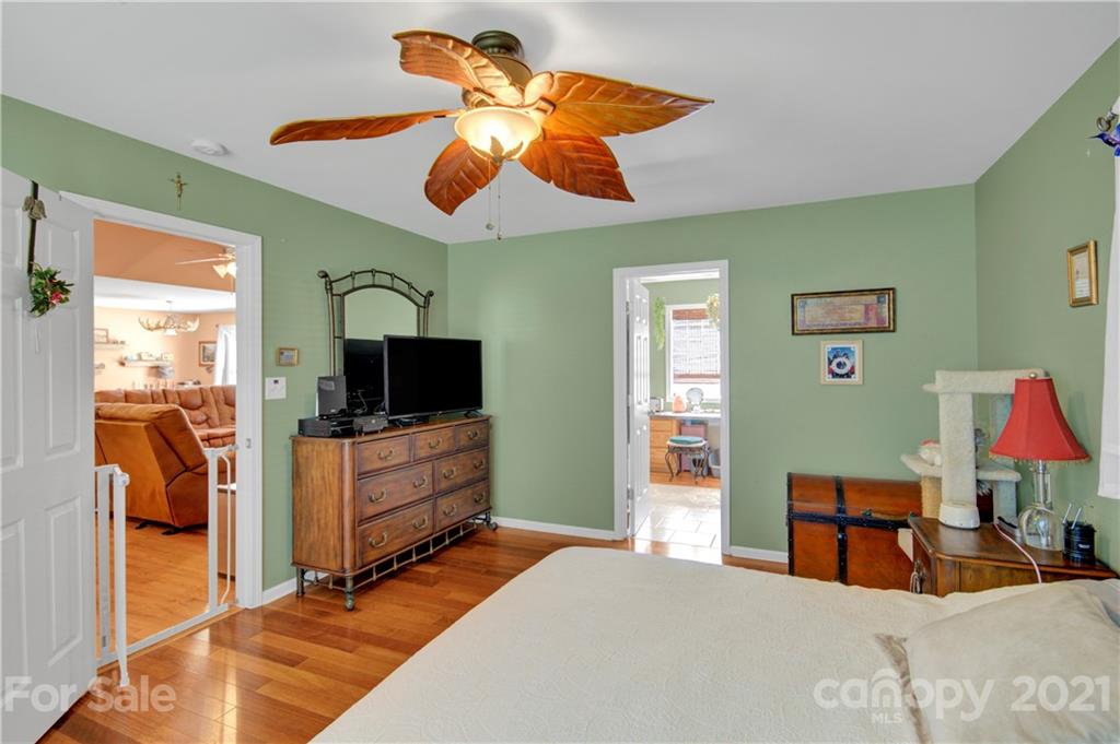 3520 Mack Ballard Road Maiden, NC 28650 - Photo 22 of 25 a bedroom with a bed and a flat screen tv