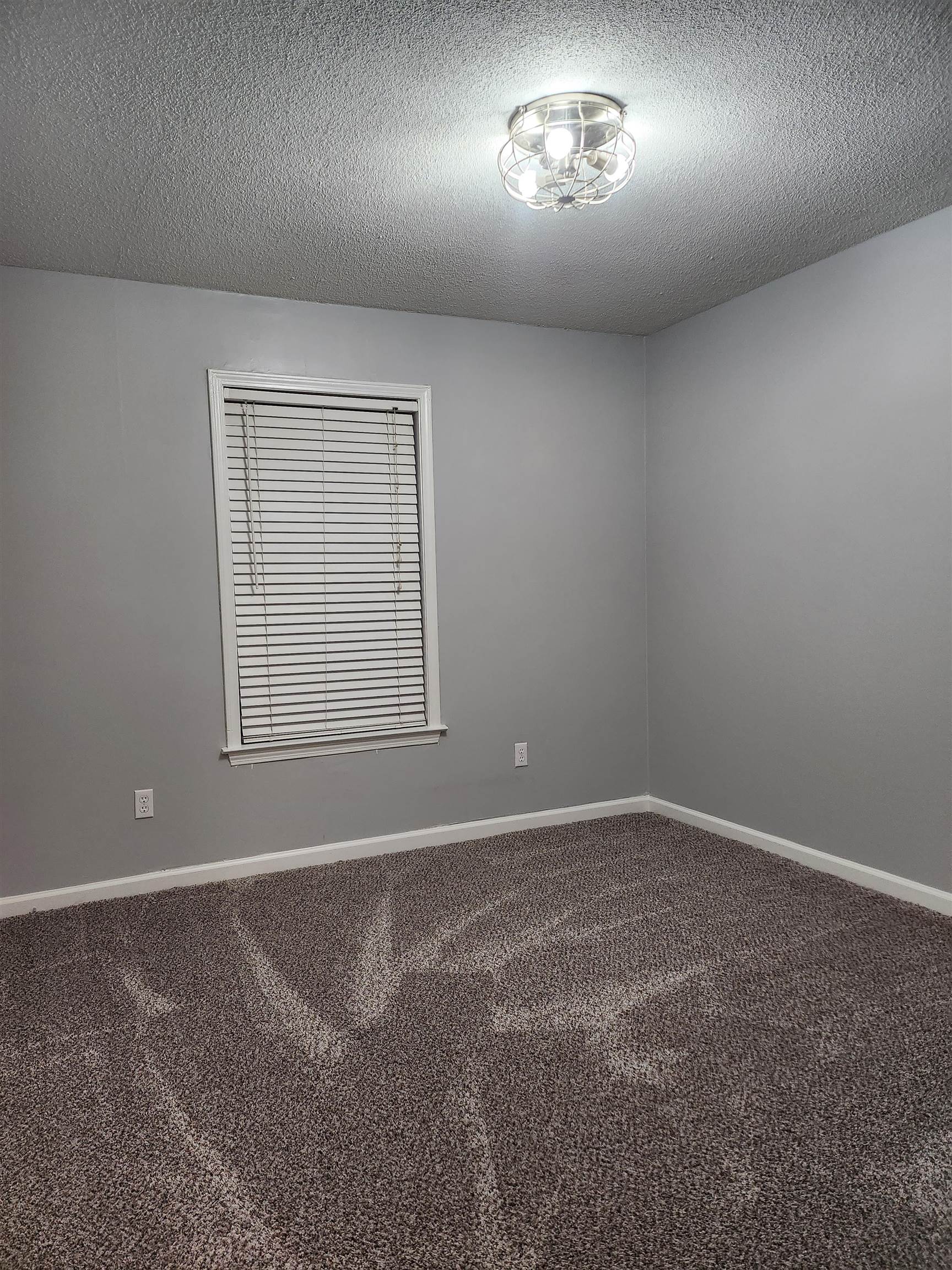 Undisclosed Address Marion, AR 72364 - Photo 11 of 12 an empty room with a workspace