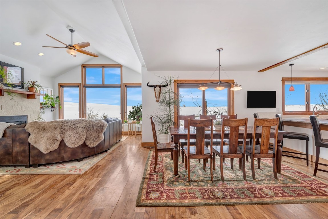 870 Dry Creek Road Hayden, CO 81639 - Photo 4 of 50 a view of a dining room with furniture window and wooden floor