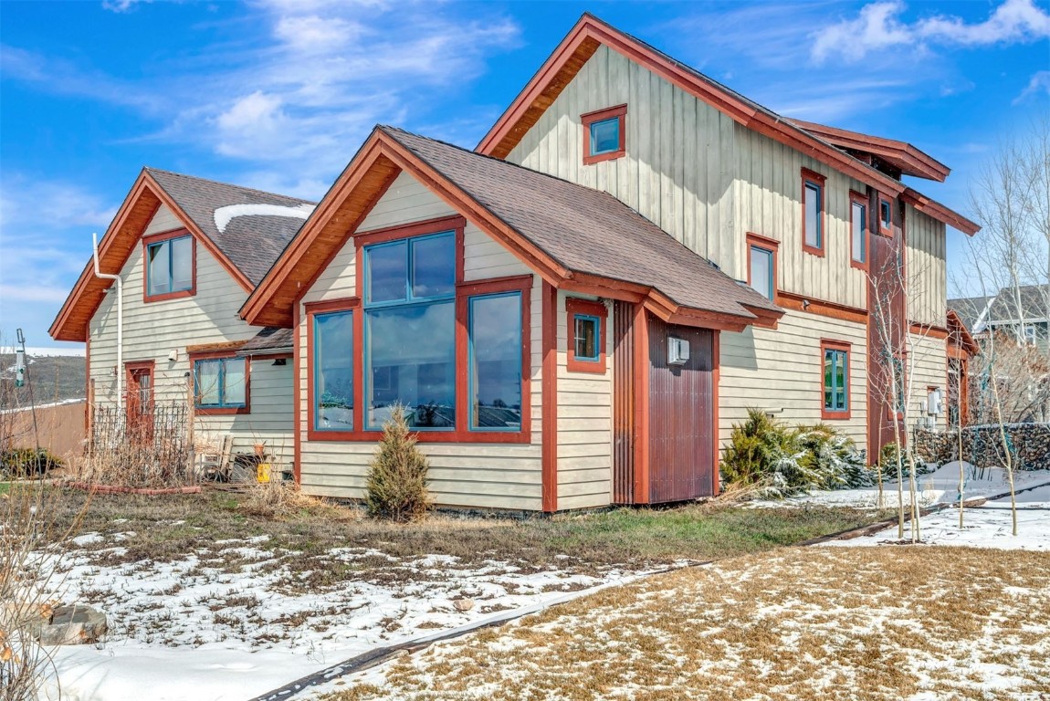 870 Dry Creek Road Hayden, CO 81639 - Photo 47 of 50 a front view of a house with garden
