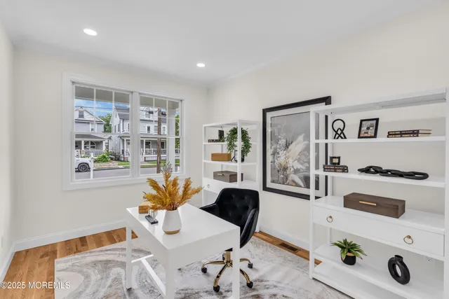 a workspace with furniture and window