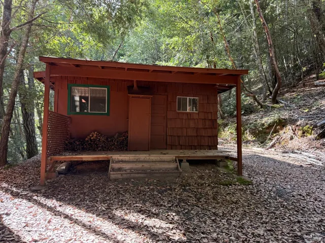 a backyard of a house with lots of green space