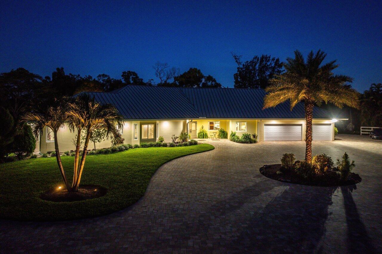 6624 Dillman Road Greenacres, FL 33413 - Photo 76 of 77 Twilight Front
