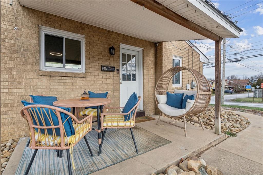 1000 Colfax Street Springdale, PA 15144 - Photo 24 of 25 a view of deck with a table and chairs