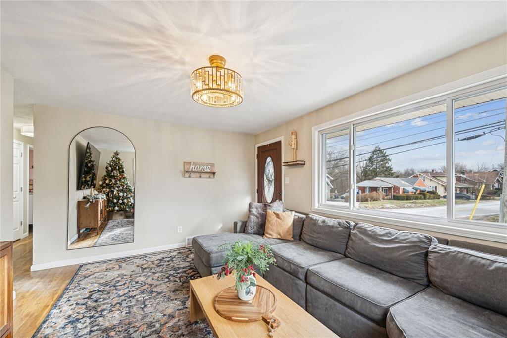1000 Colfax Street Springdale, PA 15144 - Photo 4 of 25 a living room with furniture and a large window