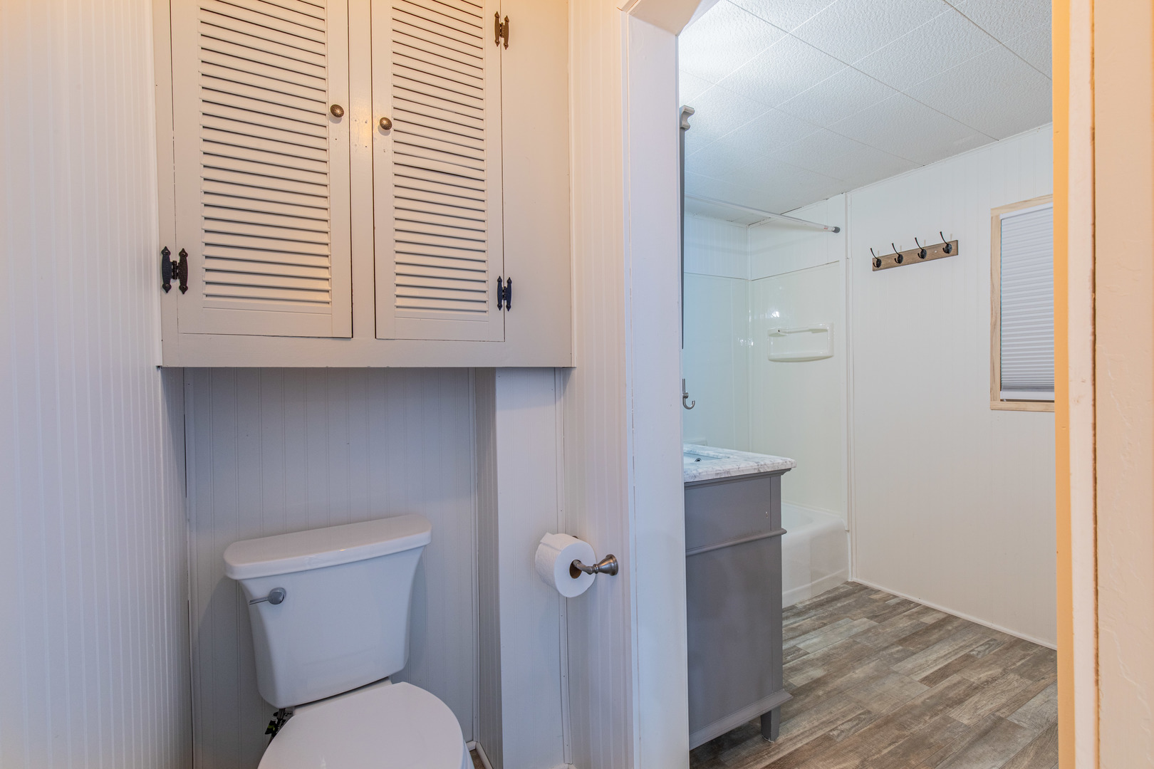 9 South Randolph Street Princeton, IL 61356 - Photo 13 of 26 a bathroom with a toilet sink and mirror