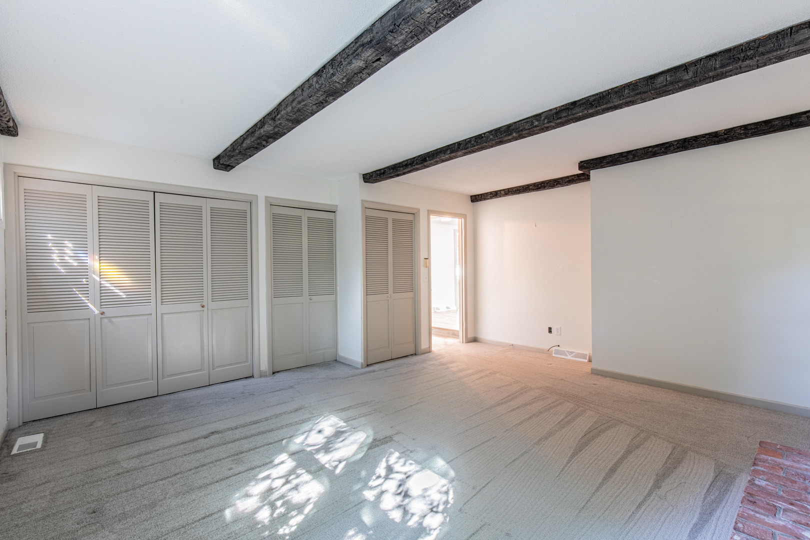 9 South Randolph Street Princeton, IL 61356 - Photo 19 of 26 a view of an empty room with wooden floor and entryway