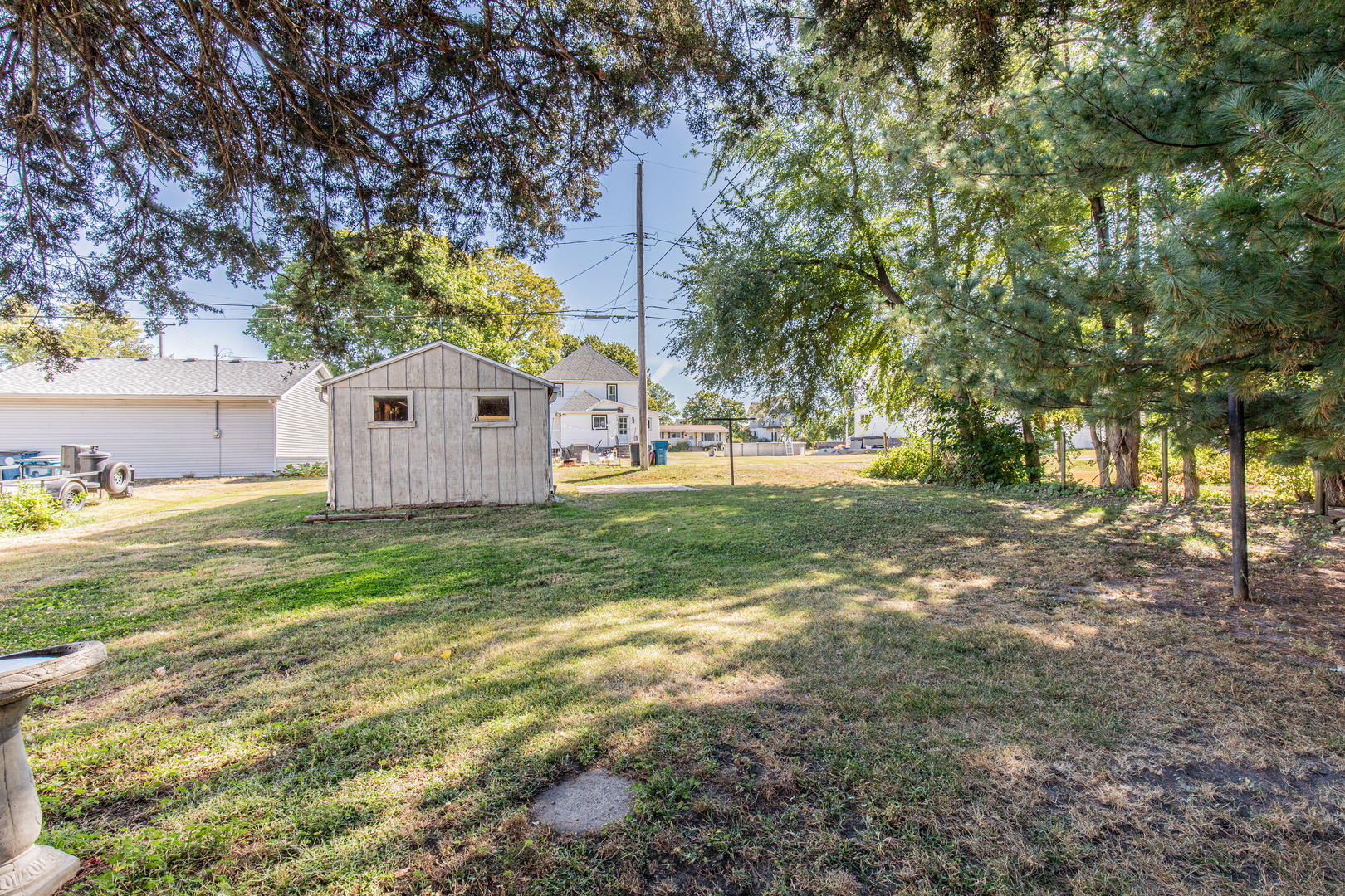 9 South Randolph Street Princeton, IL 61356 - Photo 23 of 26 a view of a house with backyard and tree s