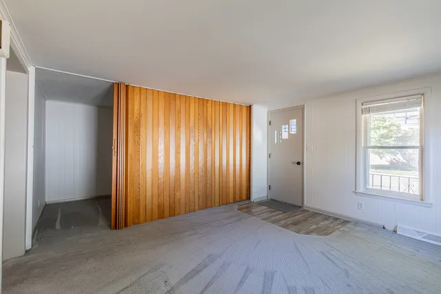 an empty room with windows