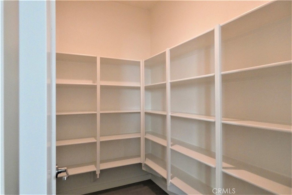 130 Acamar Irvine, CA 92618 - Photo 18 of 43 a view of walk in closet with empty racks
