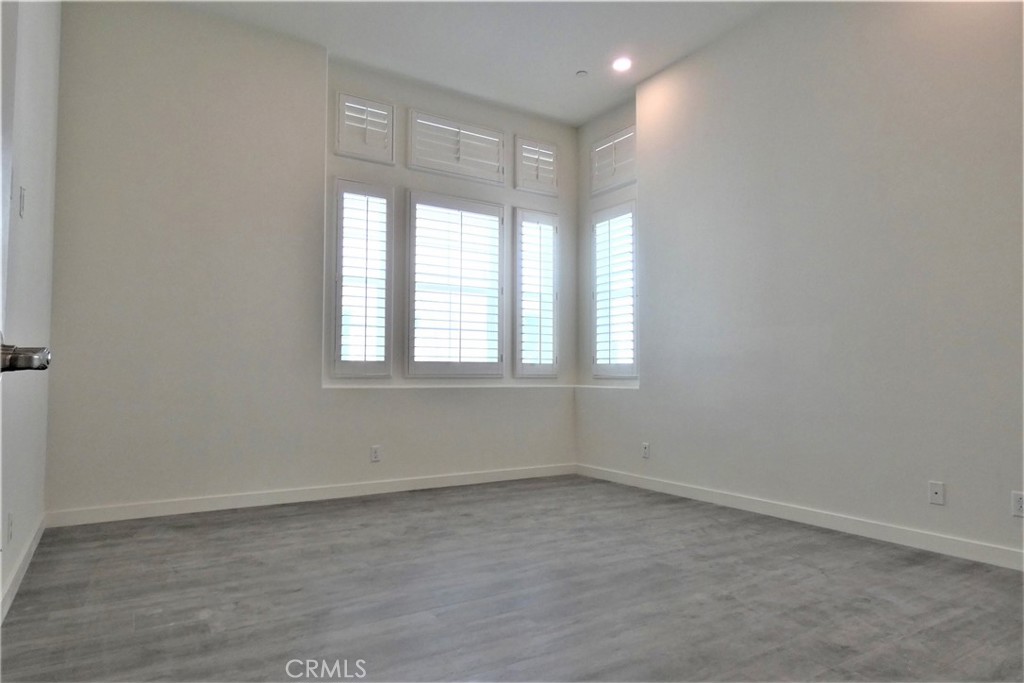 130 Acamar Irvine, CA 92618 - Photo 21 of 43 an empty room with a window
