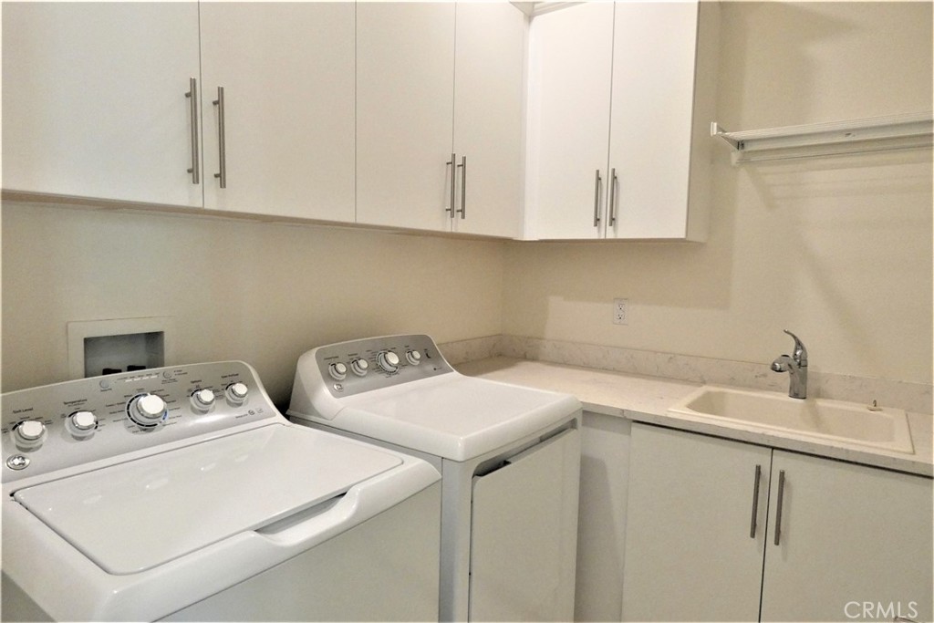130 Acamar Irvine, CA 92618 - Photo 31 of 43 a utility room with dryer and washer