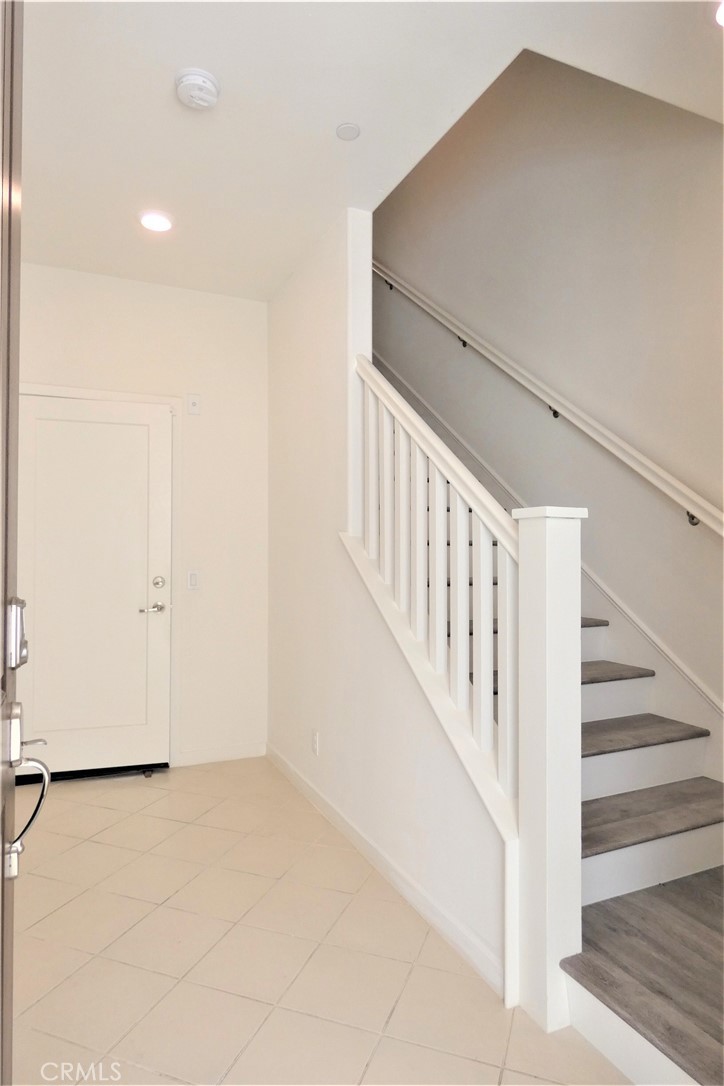 130 Acamar Irvine, CA 92618 - Photo 4 of 43 a view of entryway with stairs