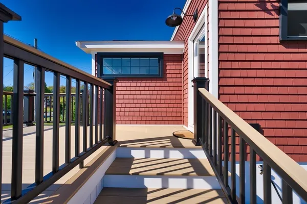 a view of a balcony with stairs