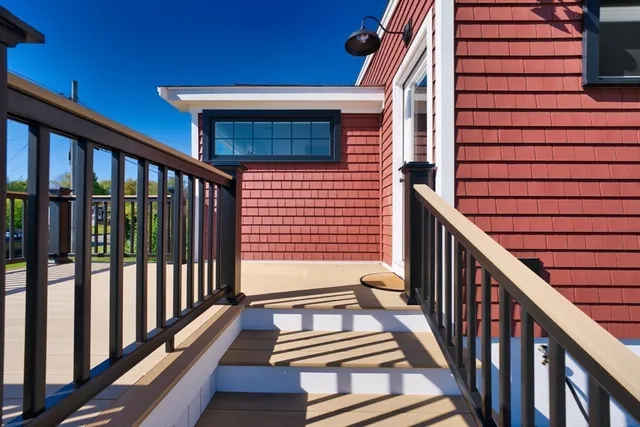 a view of a balcony with stairs