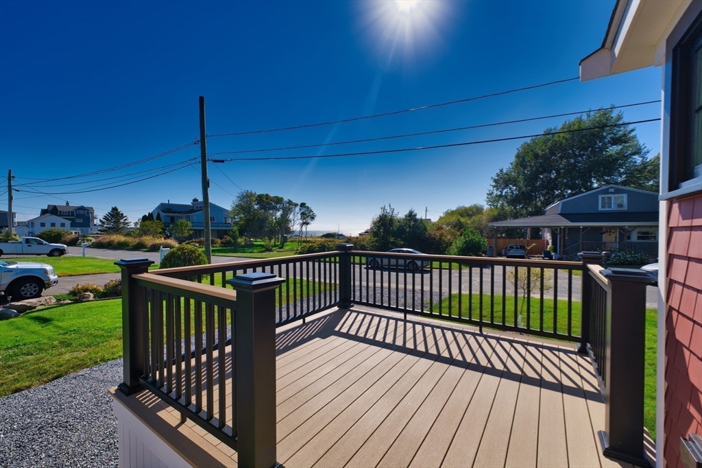 41 Point Street Fairhaven, MA 02719 - Photo 5 of 25 a view of balcony with wooden floor and outdoor seating
