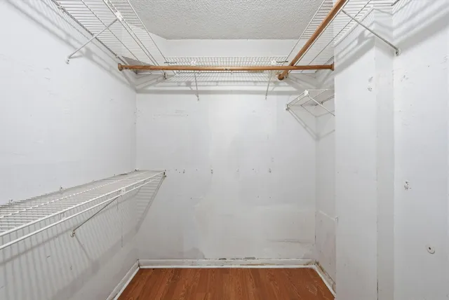 a view of a room with racks on the wall