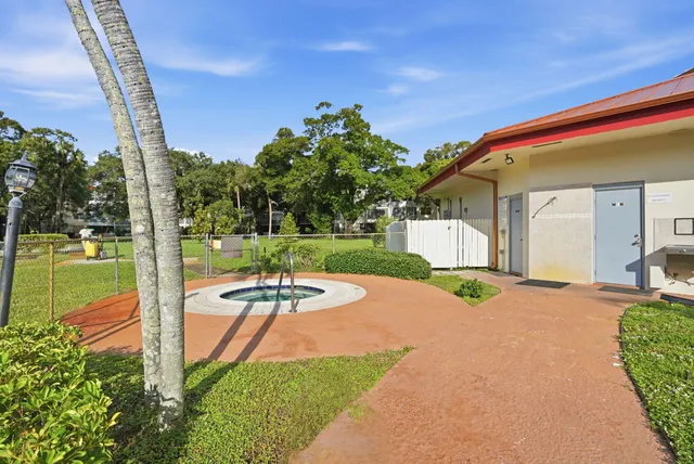 a view of a backyard with garden