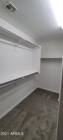 a view of a room with an empty space