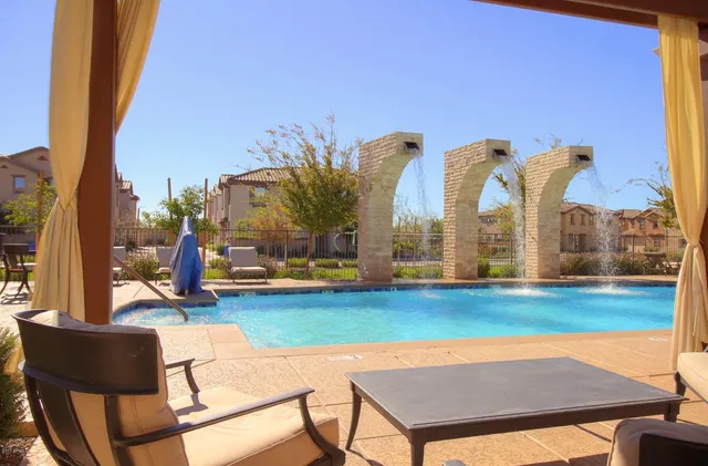 a view of swimming pool in a yard