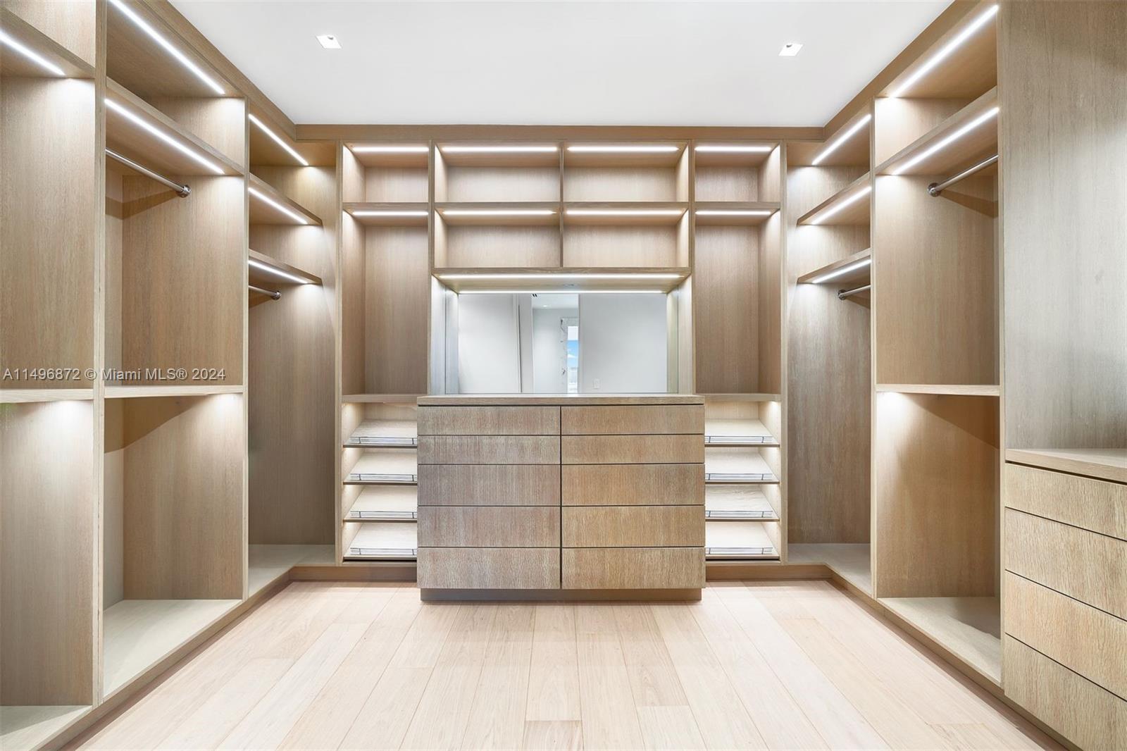 2770 Sunset Drive Miami Beach, FL 33140 - Photo 24 of 56 an empty room with wooden floor and windows