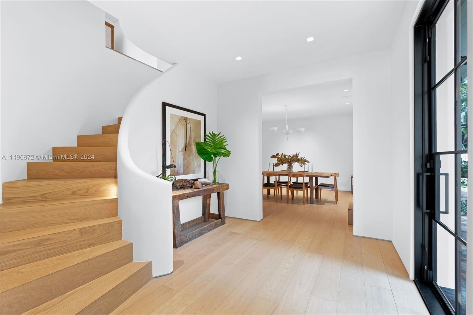 2770 Sunset Drive Miami Beach, FL 33140 - Photo 3 of 56 a view of dining room with furniture and entryway