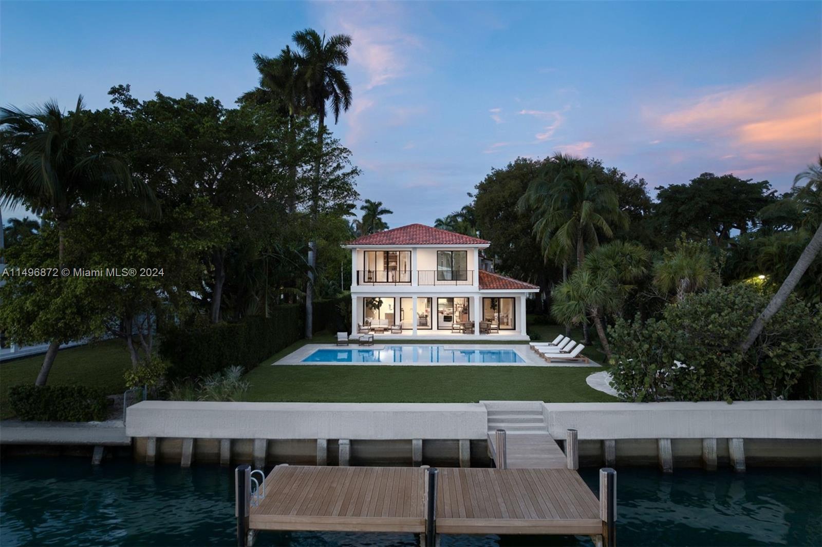 2770 Sunset Drive Miami Beach, FL 33140 - Photo 41 of 56 a view of table and chairs in patio