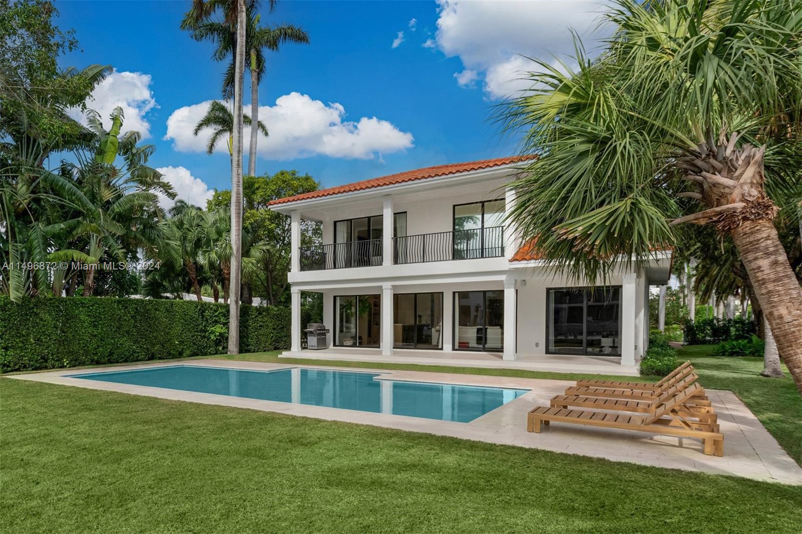 2770 Sunset Drive Miami Beach, FL 33140 - Photo 47 of 56 a view of house with yard and swimming pool
