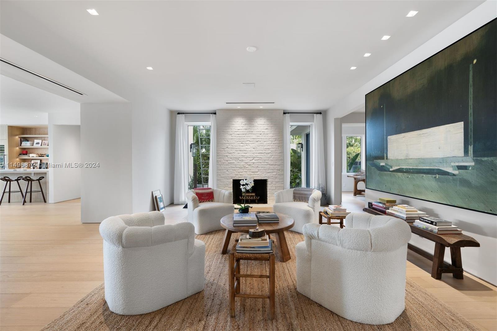 2770 Sunset Drive Miami Beach, FL 33140 - Photo 8 of 56 a living room with fireplace furniture and a flat screen tv