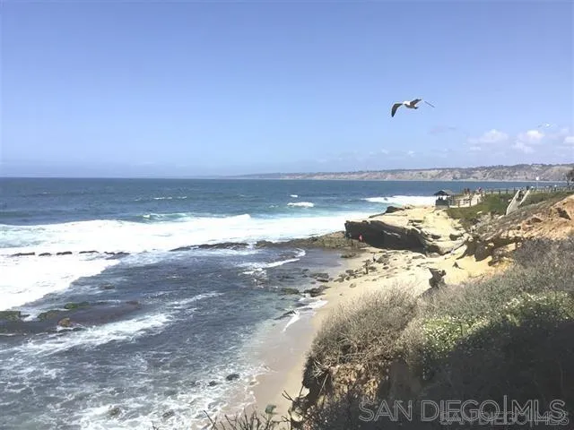 939 Coast Boulevard, Unit 3D La Jolla, CA 92037 - Photo 12 of 13 a view of an ocean beach