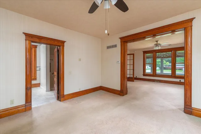 a view of a hallway with washer and dryer