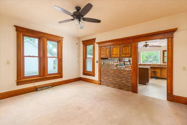 a kitchen with a stove a sink and a refrigerator